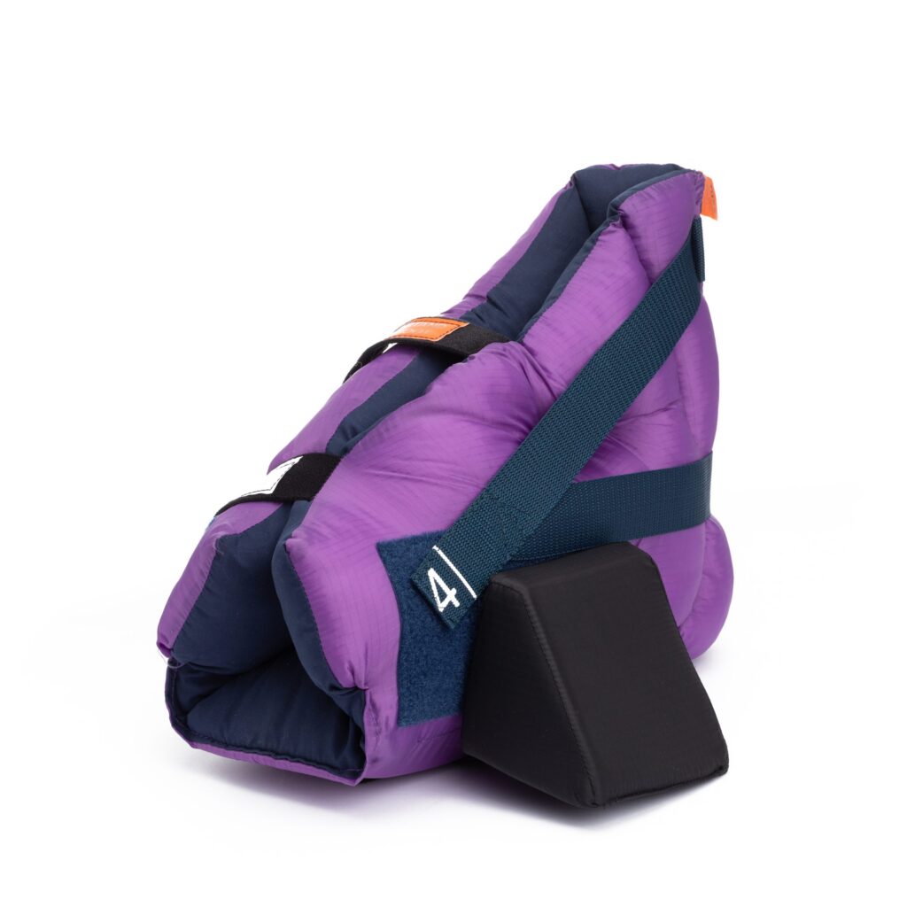 PRIMOBoot heel offloading boot with internal tapered foam wedge for pressure injury prevention.